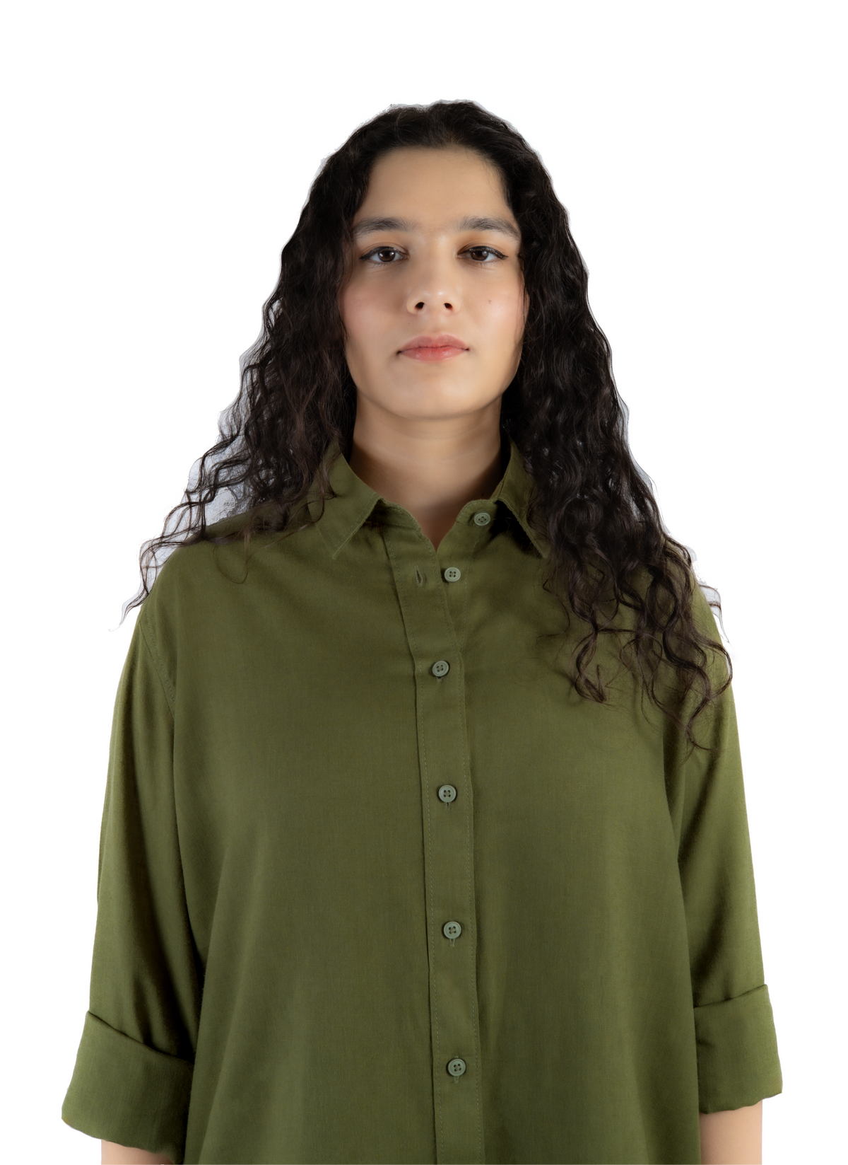 A woman with long, curly dark brown hair wearing an olive green button-down shirt, photographed against a solid white background.