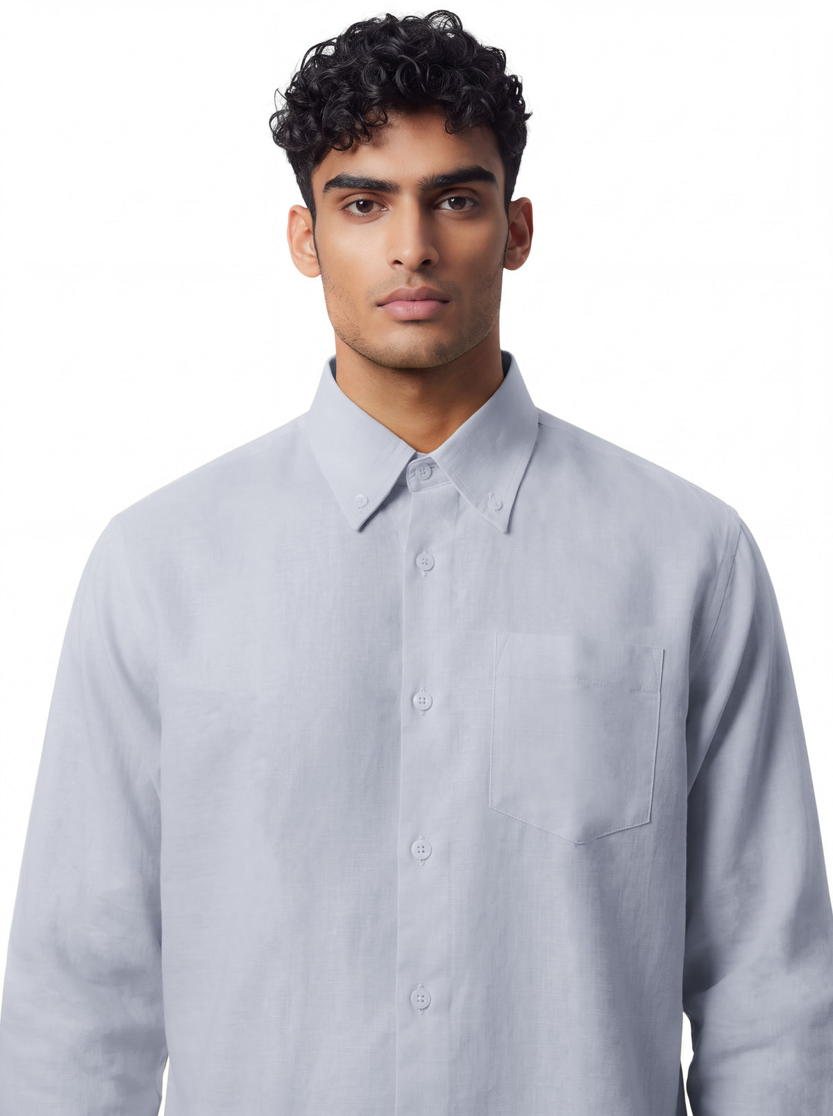 A man wearing a light gray long-sleeve button-down shirt with a chest pocket, photographed against a plain white background.